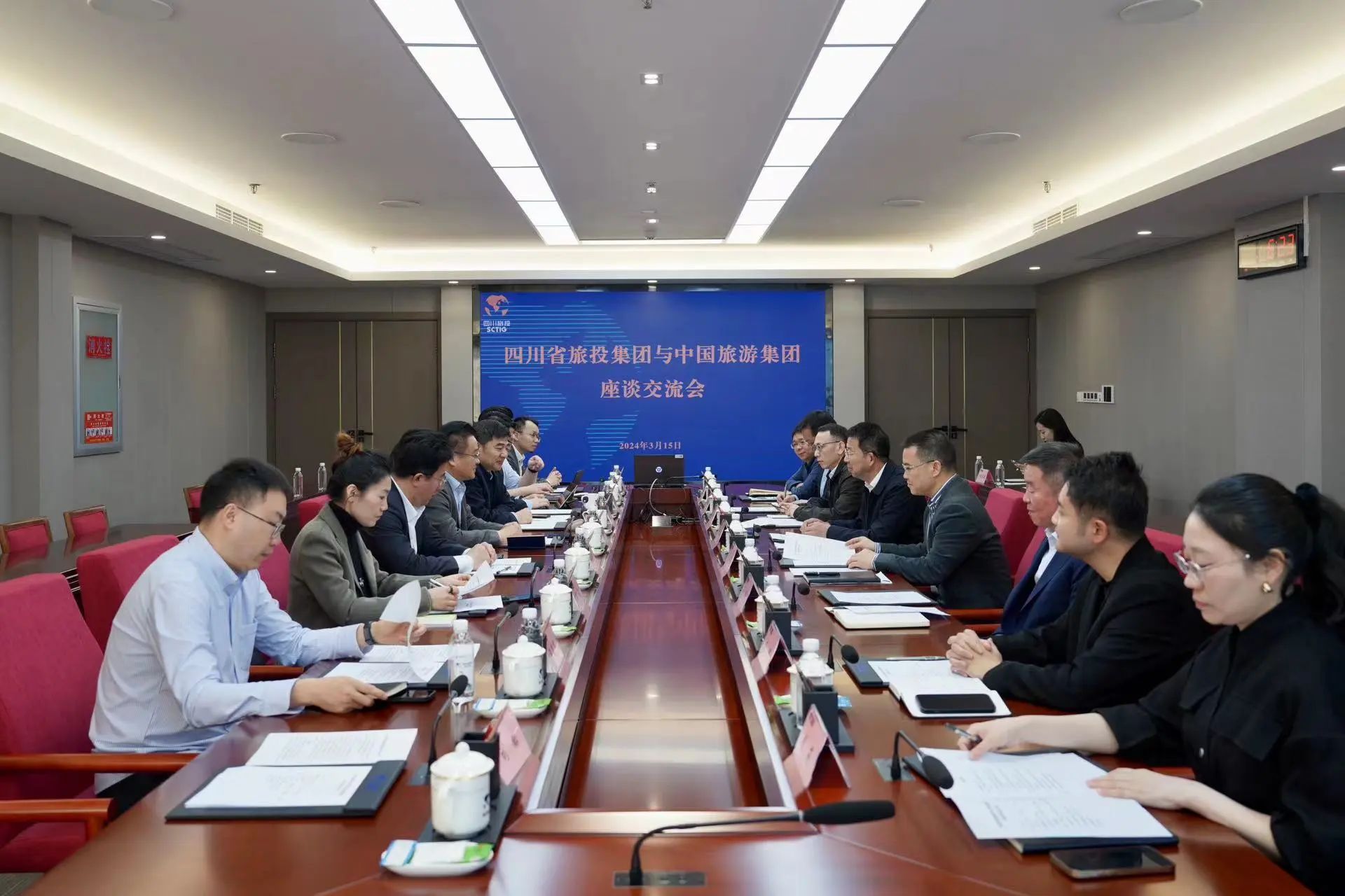 省6008集团官方网站集团与中国旅游集团举行座谈交流会